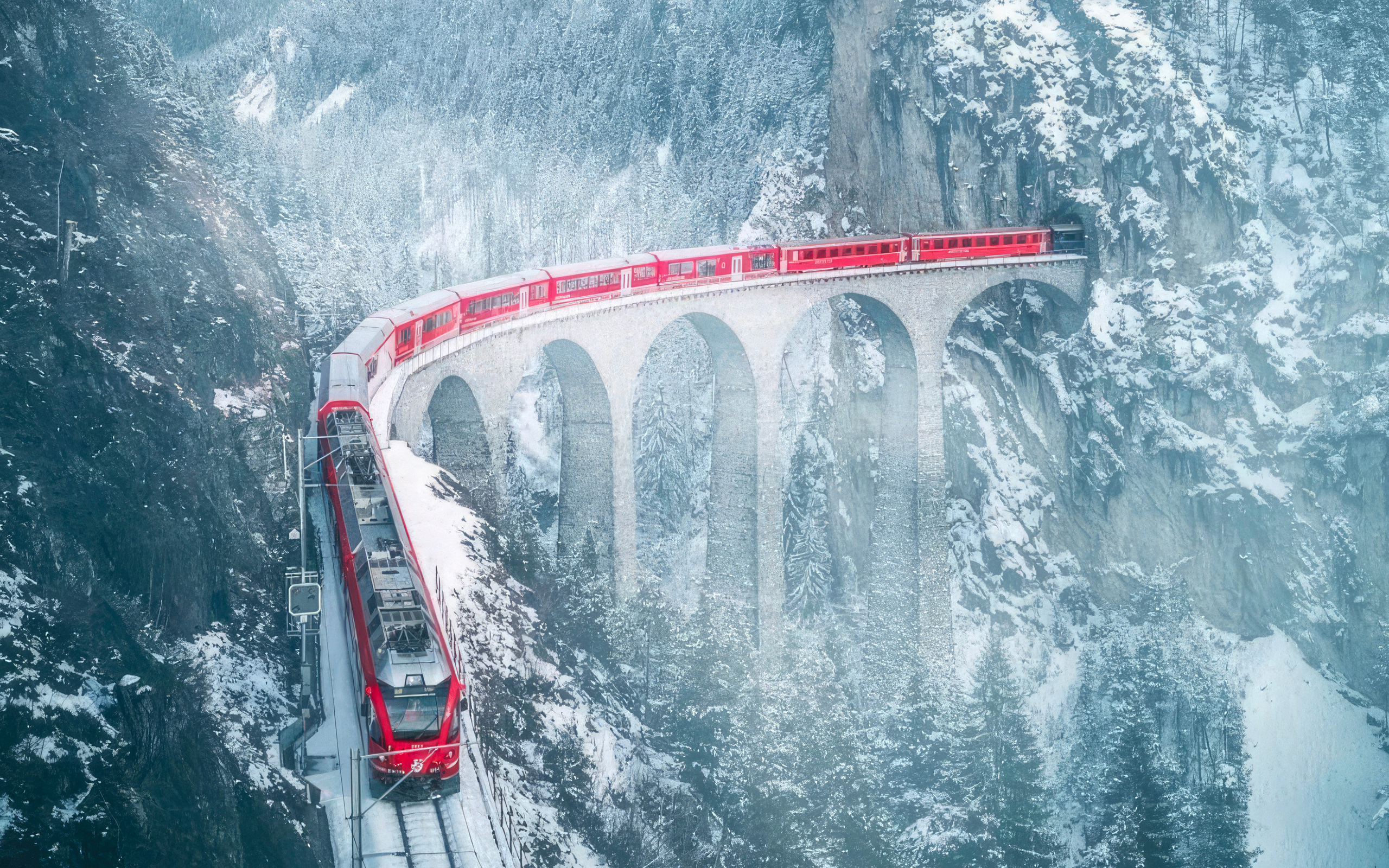 switzerland-red-train-with-snow-ow-2560x1600 (1).jpg