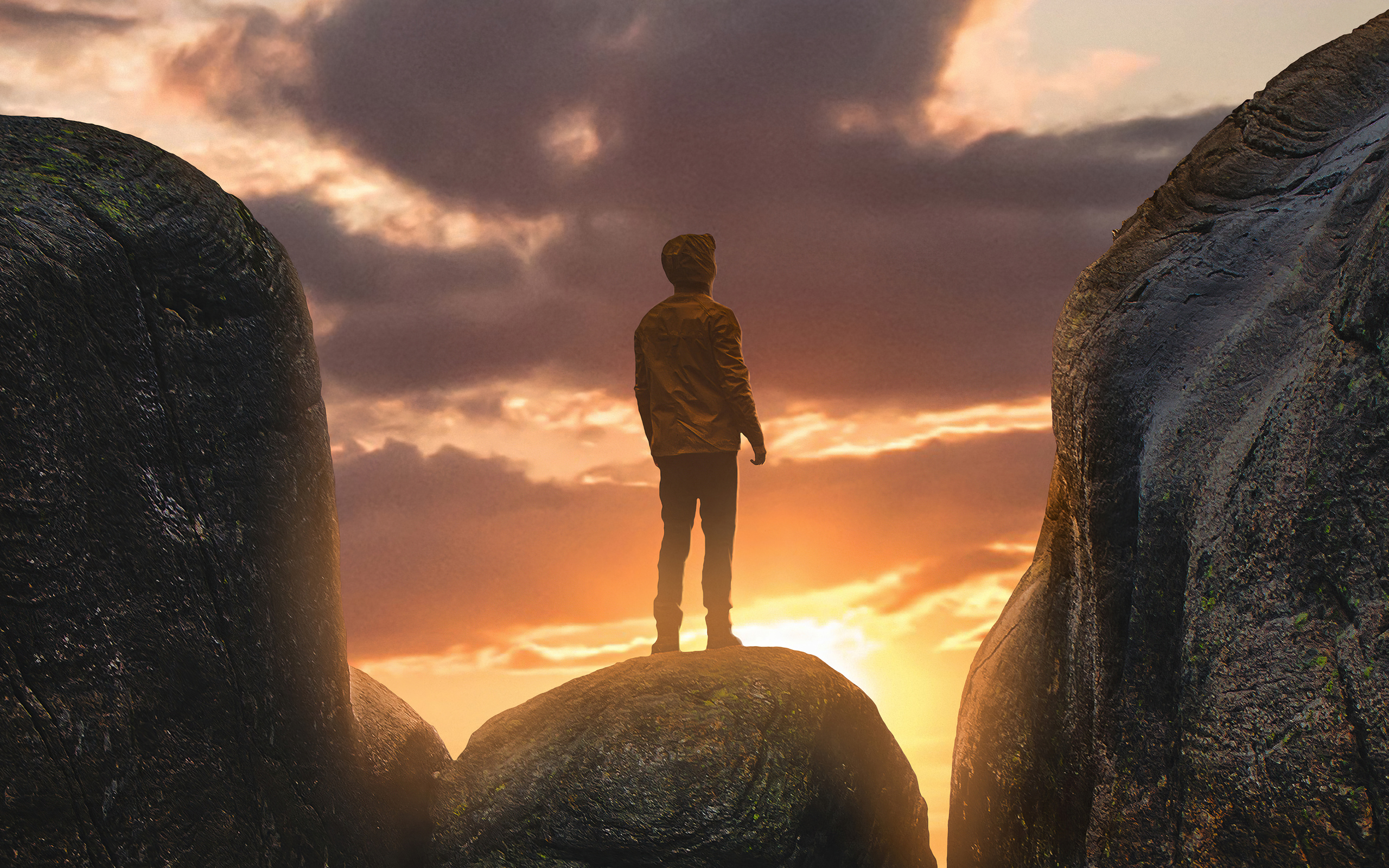 boy-standing-on-a-boulder-in-between-mountains-9n-2560x1600.jpg